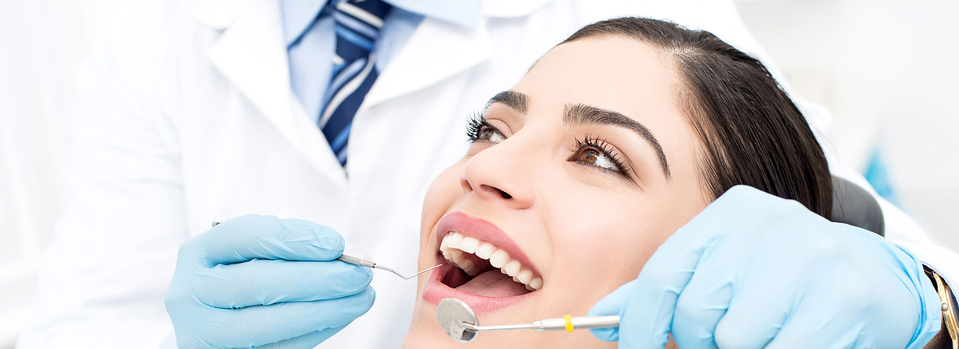 Female patient receiving dental care