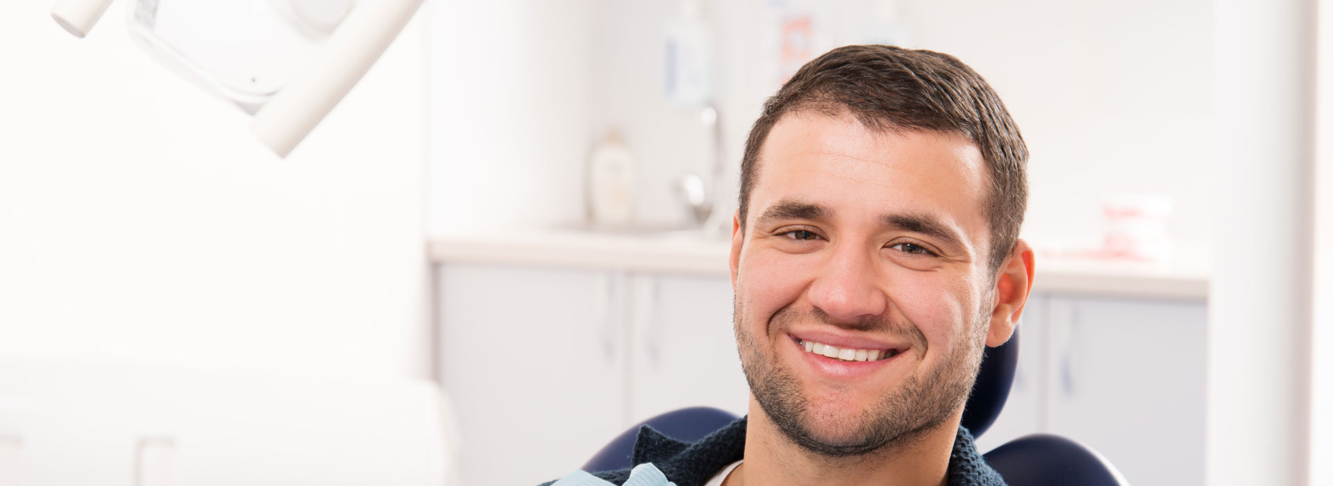 A man getting ready for dental implant treatment